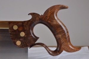 Walnut crotch, with its typical swirls, rays, and variegated grain.
