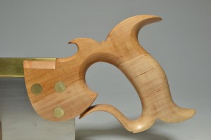 Apple, showing the contrast between the lighter sapwood and darker heartwood.