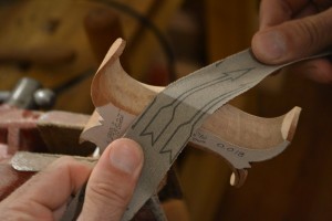 Sand from a variety of angles and directions to blend all of the curves together.