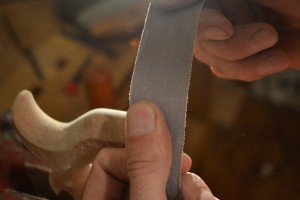 Sanding the edge of the horn.