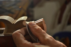 Sanding the lamb's tongue transition.
