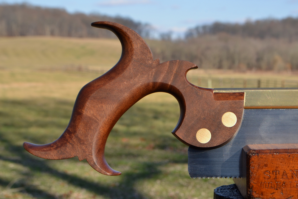 Closeup of 10 inch dovetail saw handle in desert ironwood