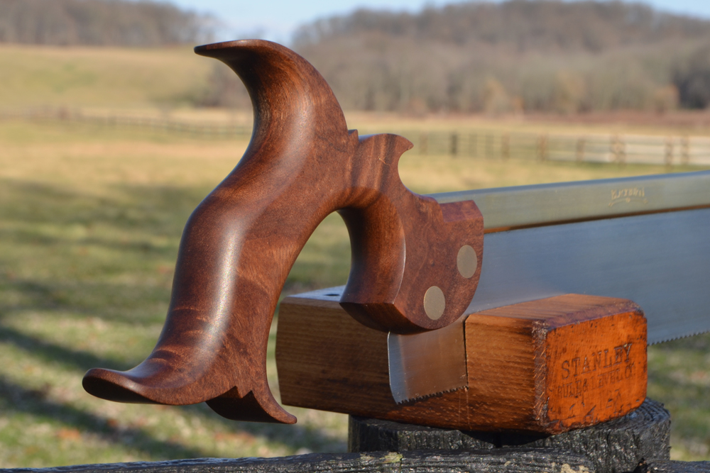 Closeup of 10 inch dovetail saw handle in desert ironwood