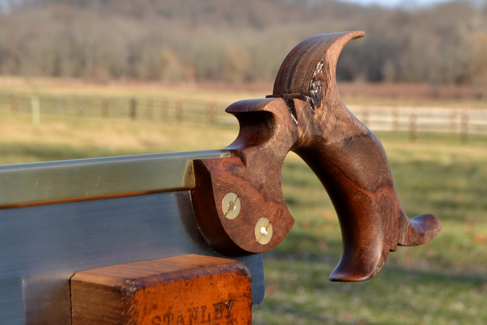 Closeup of 10 inch dovetail saw handle in desert ironwood