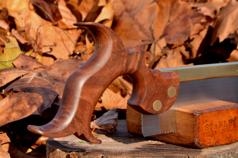 Closeup of 10 inch dovetail saw handle in desert ironwood