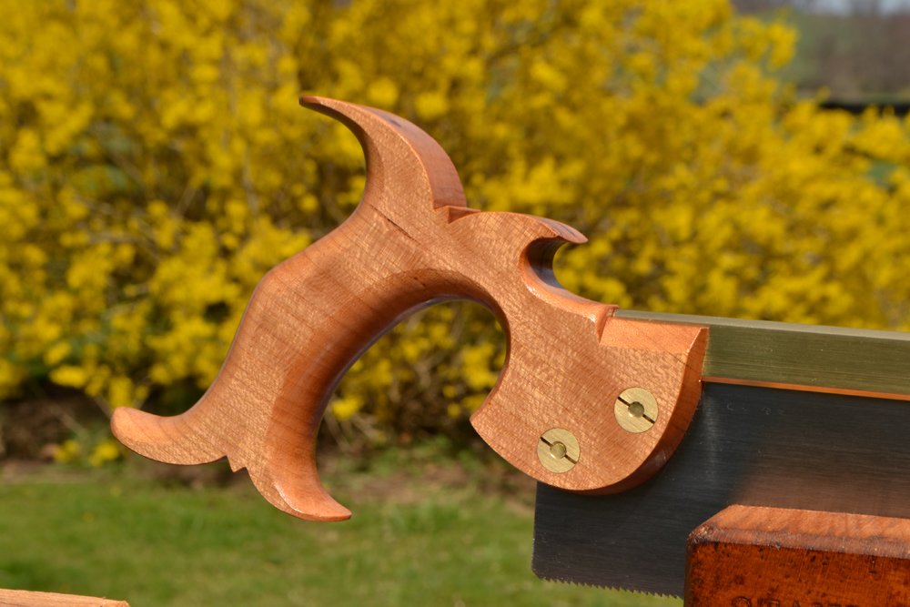 Close-up of 10 inch dovetail saw handle in quartersawn cherry
