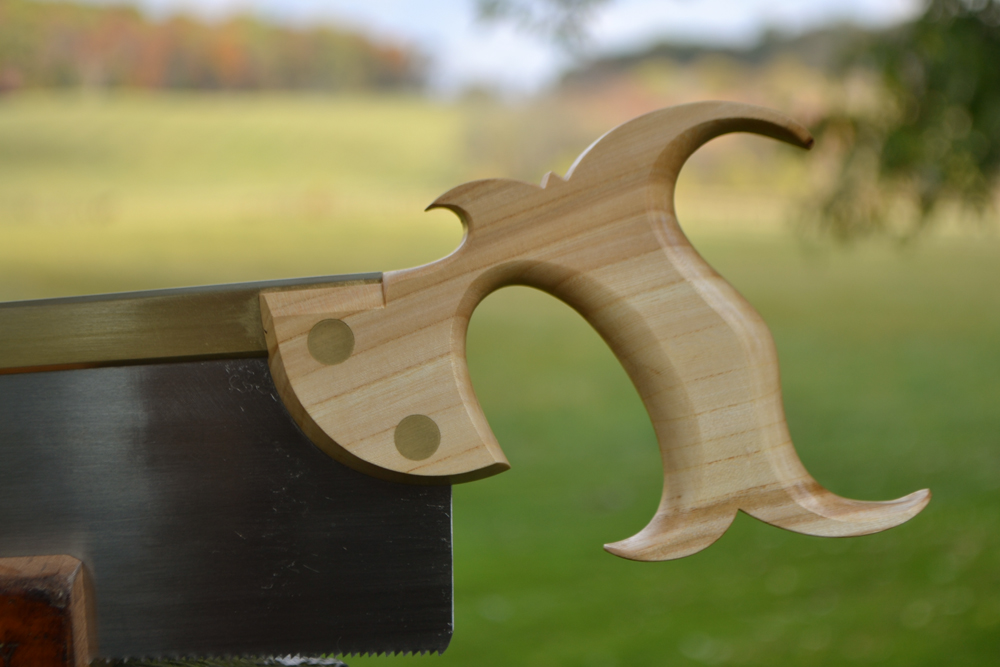 Closeup view of the handle on 12 inch Smith's Key carcase saw in quartersawn elm