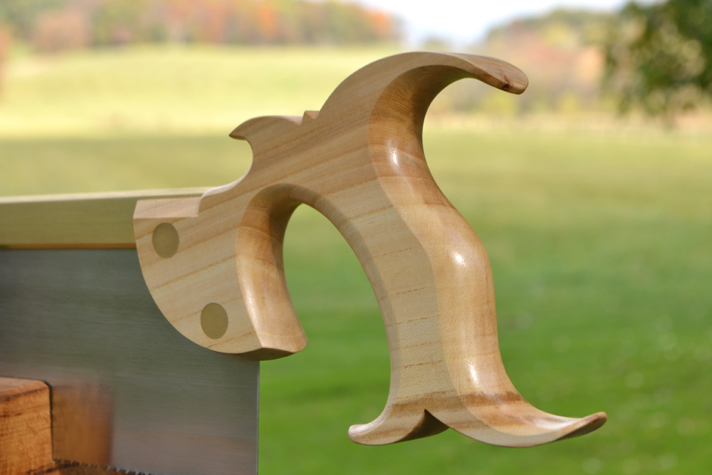 Closeup view of the handle on 12 inch Smith's Key carcase saw in quartersawn elm