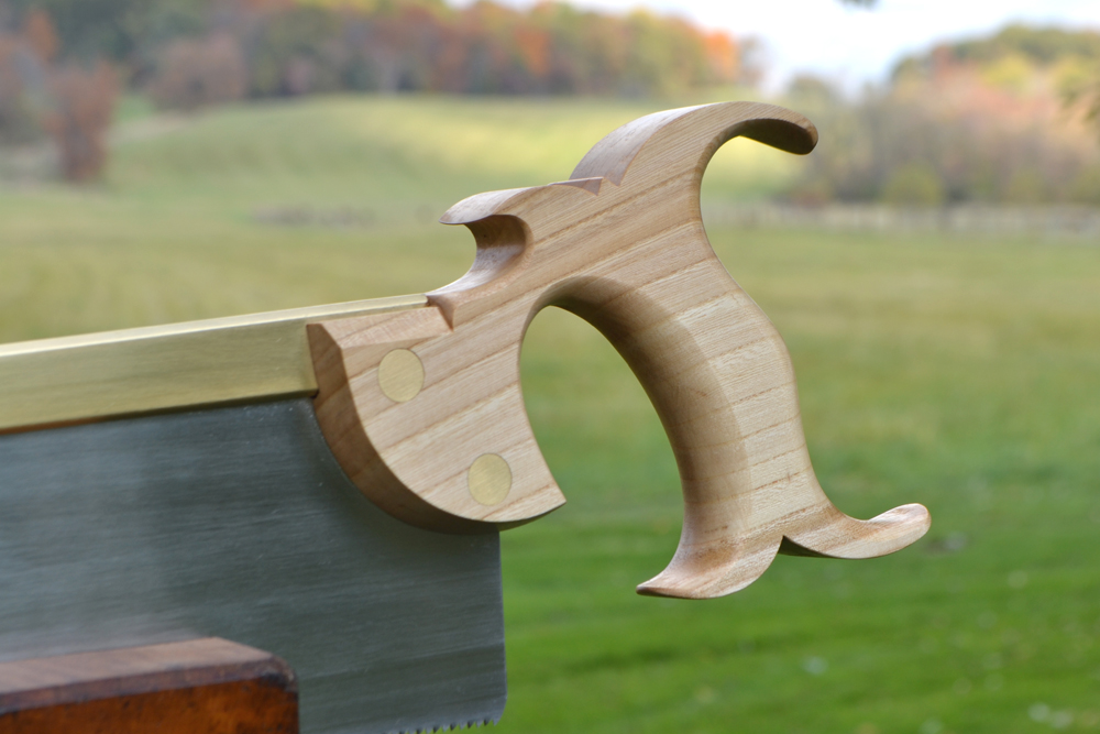 Closeup view of the handle on 12 inch Smith's Key carcase saw in quartersawn elm