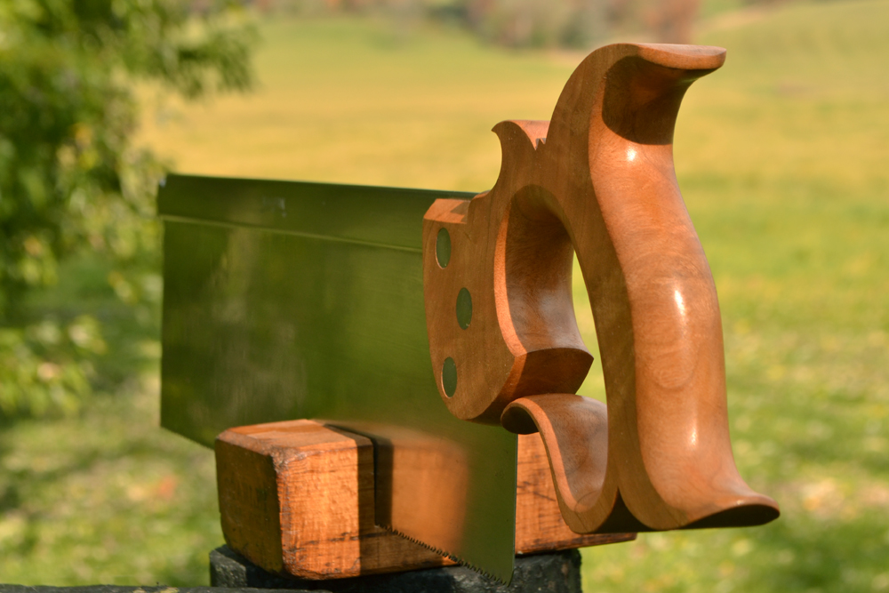 Handle closeup view of 14 inch sash saw in cherry crotch