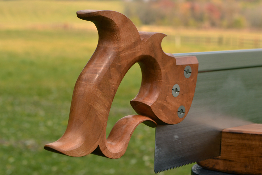 Handle closeup view of 14 inch sash saw in cherry crotch