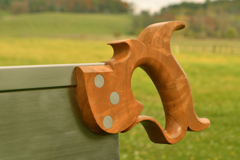 Handle closeup view of 14 inch sash saw in cherry crotch