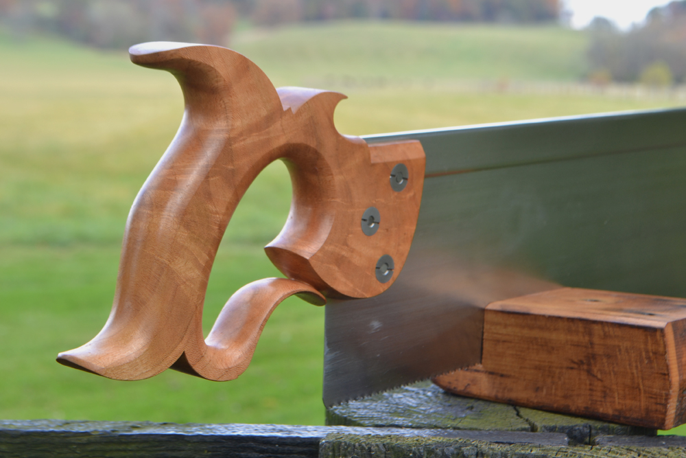 Handle closeup view of 14 inch sash saw in cherry crotch
