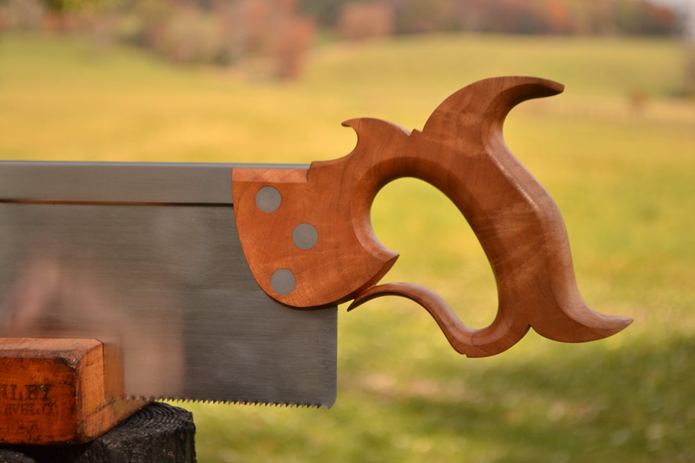 Close up view of 14 inch sash saw handle in cherry crotch