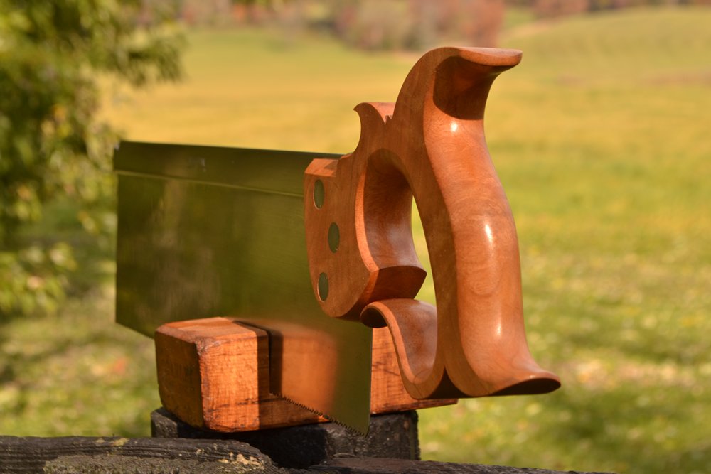 Close up view of 14 inch sash saw handle in cherry crotch