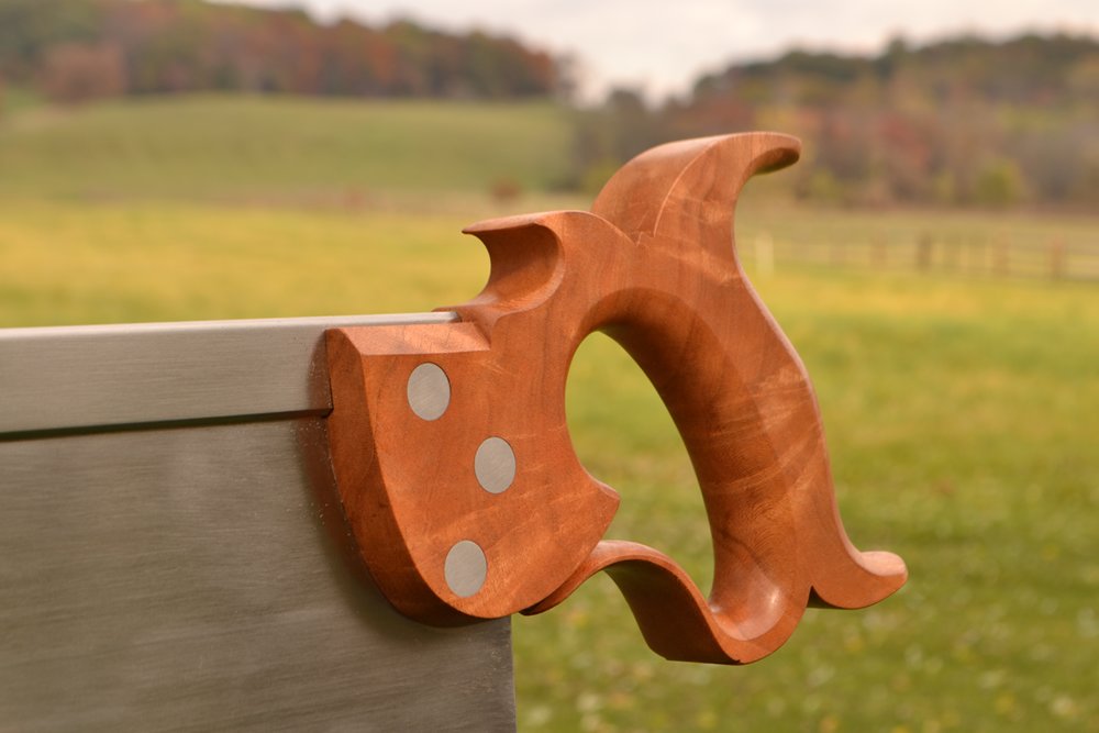 Close up view of 14 inch sash saw handle in cherry crotch
