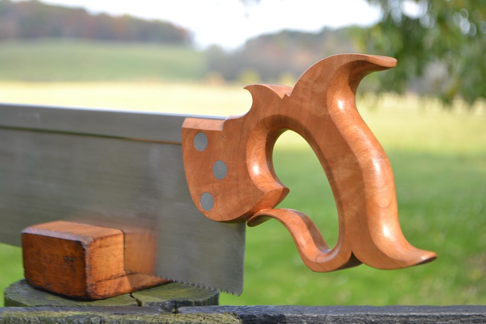 Close up view of 14 inch sash saw handle in cherry crotch