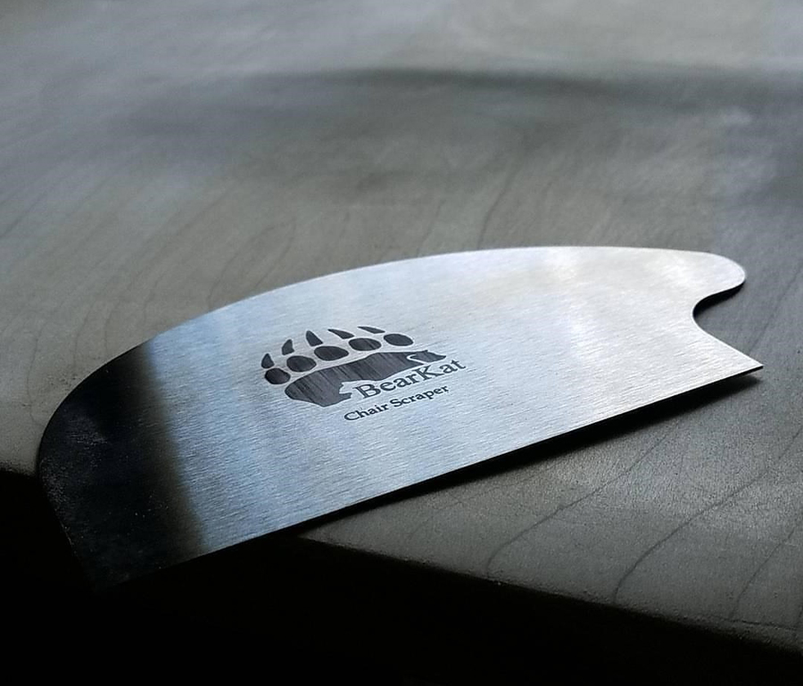 BearKat Wood chair scraper in use on chair
