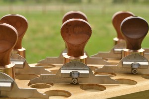 RakeMaker II with cherry handle and level attachment.